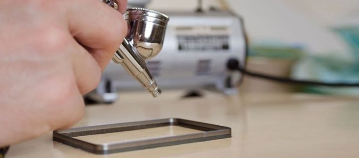 Die-Slide being applied using an airbrush.